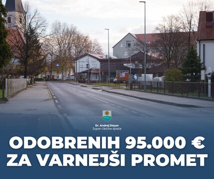 fotografirana CESTA SREDI APAČ_Z NAPISOM -odobrenih 95.000€ za varnejši promet-
